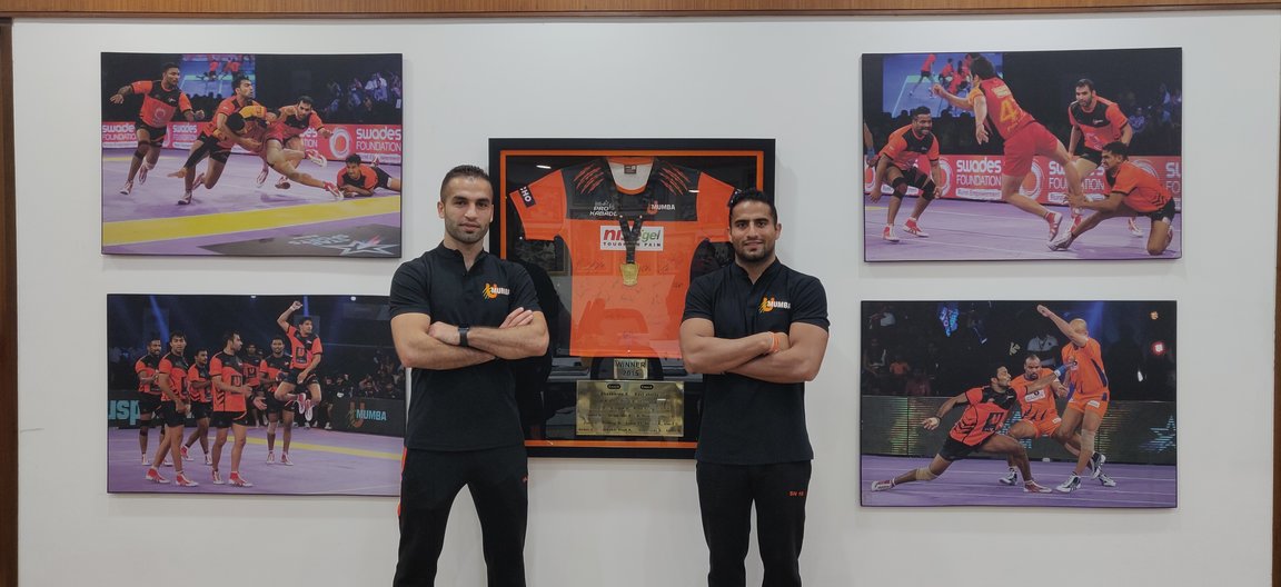 Players of UMumba celebrate after they won the Pro Kabaddi League