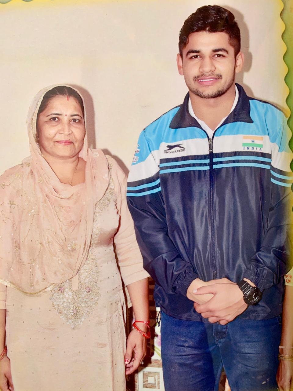 Naveen with his mother
