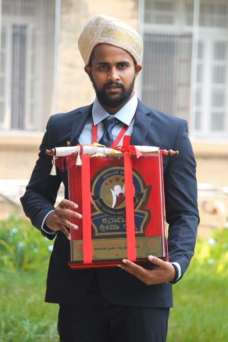 Rakshith with his award